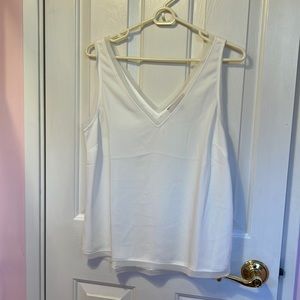 White sleeveless blouse